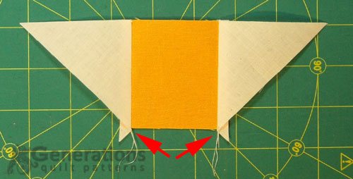 A #3 squares with a #2 QST sewn to each side A #3 squares with a #2 QST sewn to each side