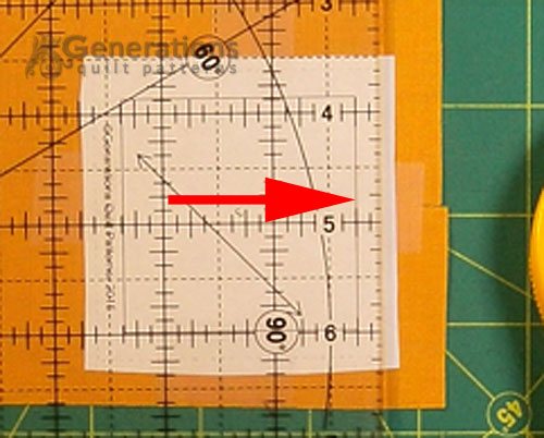 Align the 1/4" mark on the ruler with the stitching line