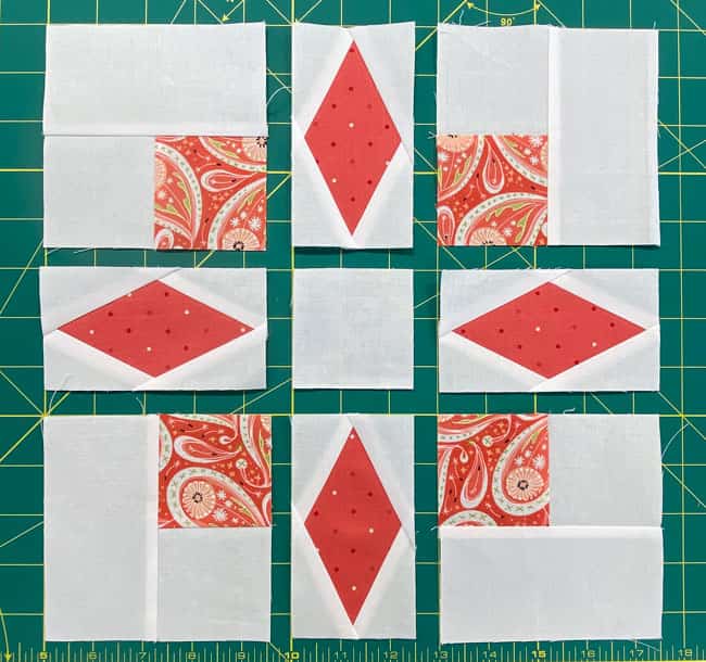 Arrange and stitched and cut patches into the Nine Patch Star quilt block Arrange and stitched and cut patches into the Nine Patch Star quilt block