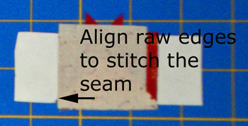 Align the raw edges to the seam