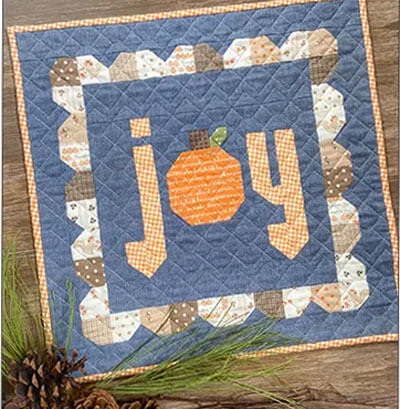 Joy Mini quilt pattern by Carried Away Quilting