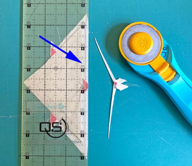 Trimming the BitA-3/4 edge to leave a perfect 1/4" seam allowance Trimming the BitA-3/4 edge to leave a perfect 1/4" seam allowance