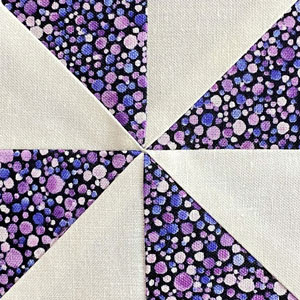 Learn how to paper piece a Pinwheel quilt block here
