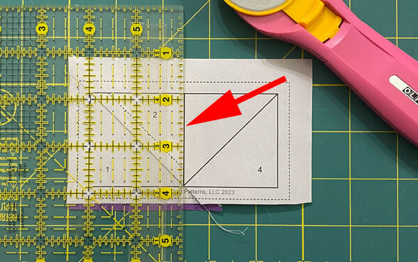 Position your ruler over the sewing line between #2 and #3
