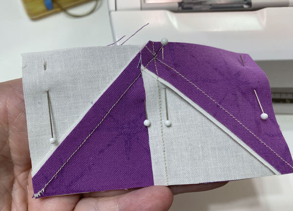 Pin through just the patches and now the seam allowances Pin through just the patches and now the seam allowances