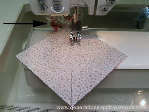 Sew a 1/4" away from both sides of the drawn line Sew a 1/4" away from both sides of the drawn line