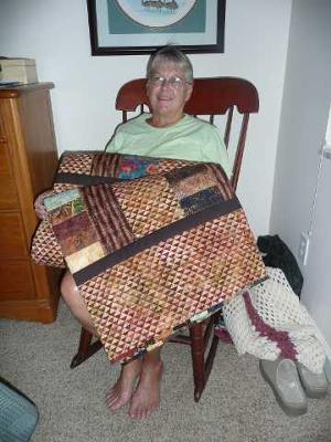 Elaine with Phil's quilt<br /><br />Click on any thumbnail below for a larger image<br /><br />