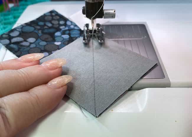 Sew on the side of the line closest to the corner Sew on the side of the line closest to the corner