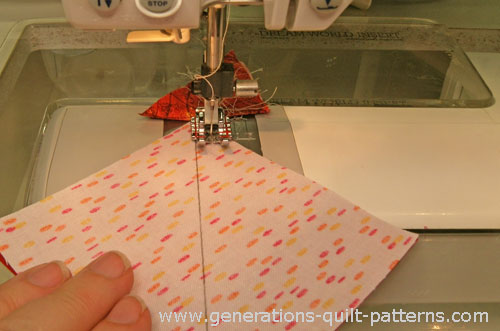 Stitch a quarter inch away from both sides of the line. Stitch a quarter inch away from both sides of the line.