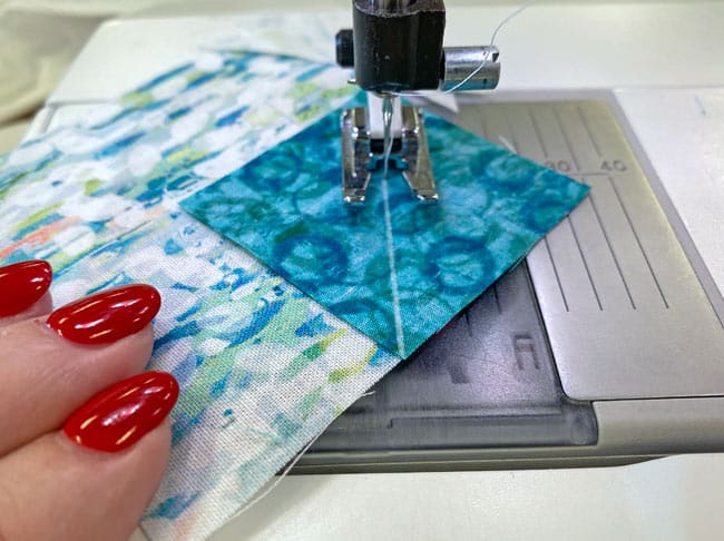 Sew on the side of the line closest to the corner