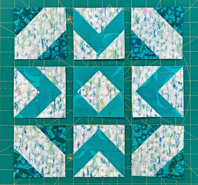 Arrange the stitched units into the Salem block design Arrange the stitched units into the Salem block design