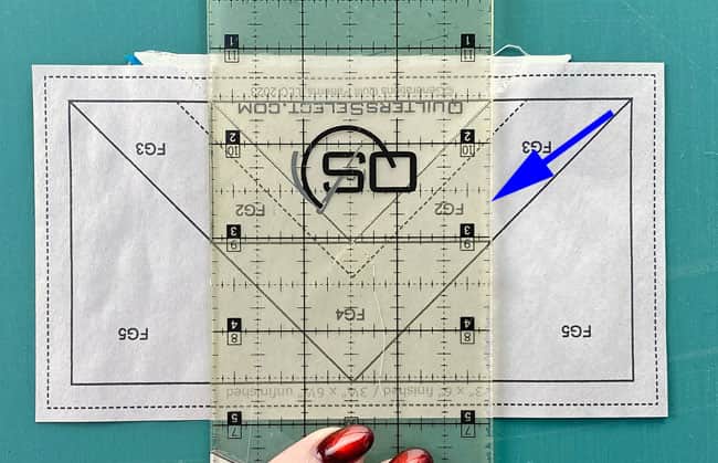 Position the ruler's edge on the line between FG2 and FG3