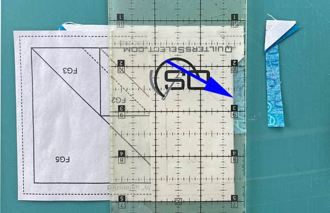 Trim away the excess FG2 fabric leaving behind a perfect 1/4" seam allowance