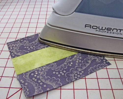 Press the seam allowance towards the darker fabric Press the seam allowance towards the darker fabric