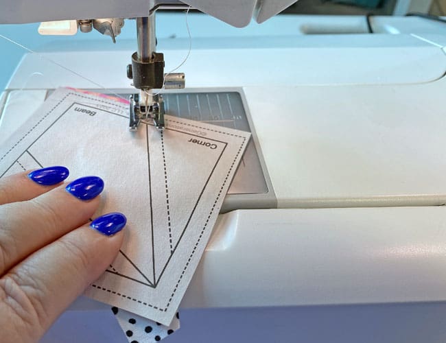 Sew the Corner and Beam unit together on the solid line, starting and stopping a good 1/4" before and after the line Sew the Corner and Beam unit together on the solid line, starting and stopping a good 1/4" before and after the line