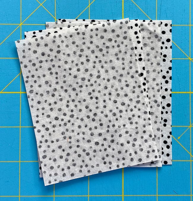 Corner patches layered in pair of right sides together Corner patches layered in pair of right sides together