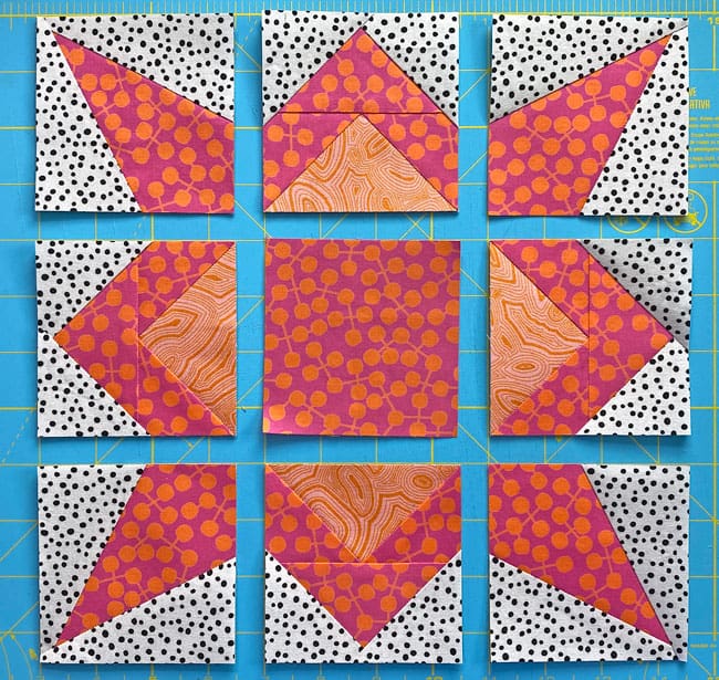 The stitched and cut patch are laid out in the Shaded Compass design The stitched and cut patch are laid out in the Shaded Compass design