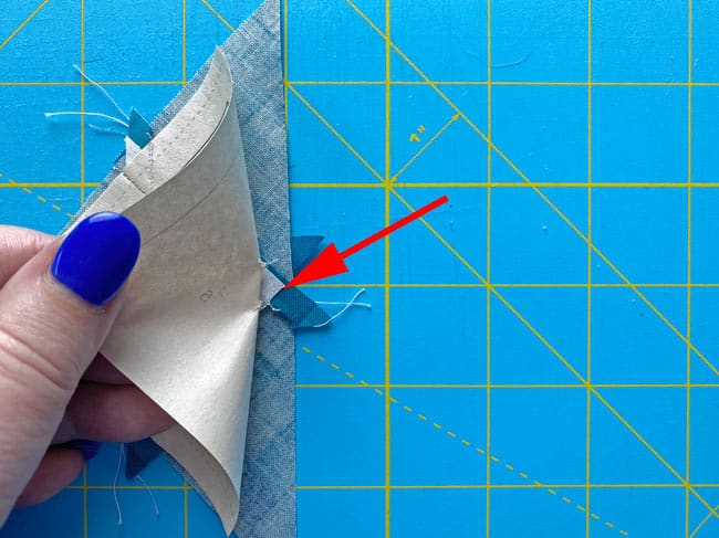 To fold the pattern back on itself on the line between #3/#4 and #5, you'll have to pull the pattern away from the stitches a bit