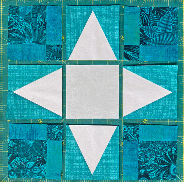 Arrange all the cut and sewn patches into the Spring Fancy design Arrange all the cut and sewn patches into the Spring Fancy design