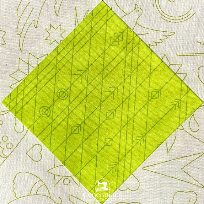 A finished, paper pieced Square in a Square quilt block A finished, paper pieced Square in a Square quilt block