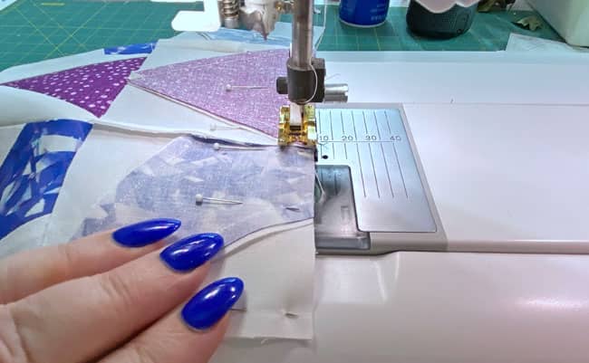 Pin the rows together to hold the edges even and seams aligned Pin the rows together to hold the edges even and seams aligned