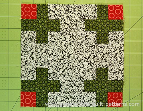 The finished Rosebud quilt block The finished Rosebud quilt block