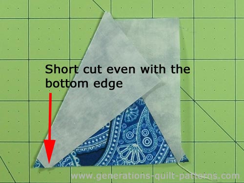 Match the edges of the second side triangle to the center triangle Match the edges of the second side triangle to the center triangle