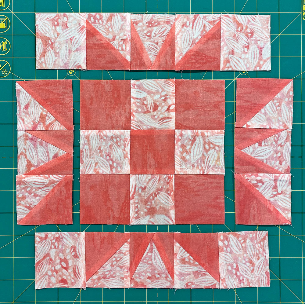 Arrange the patches into the Triangle Puzzle design