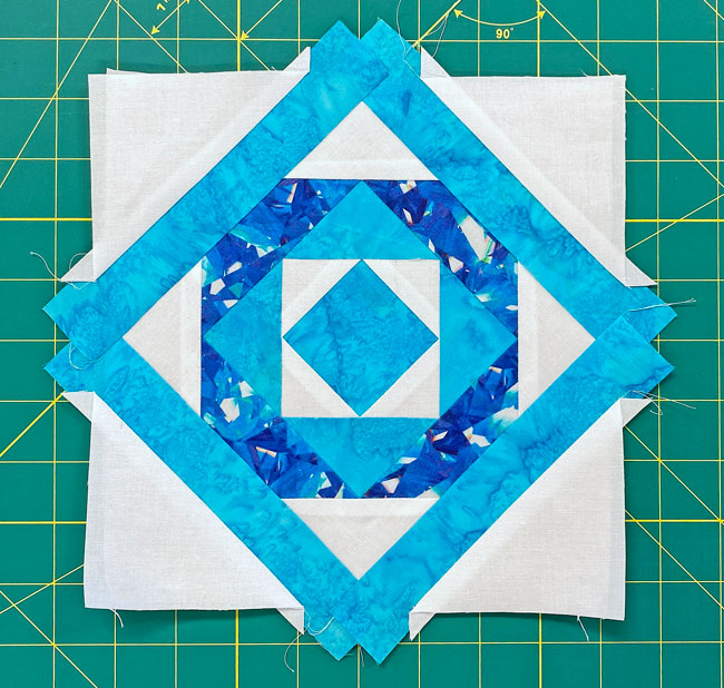 Our Tunnels quilt block is pieced, all that's left is to trim it to size