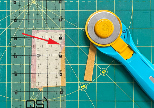 Trim away the excess fabric from #2 with a rotary cutter and ruler Trim away the excess fabric from #2 with a rotary cutter and ruler