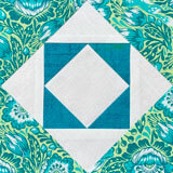 Learn to make a Twelve Triangles quilt block in one of five different sizes