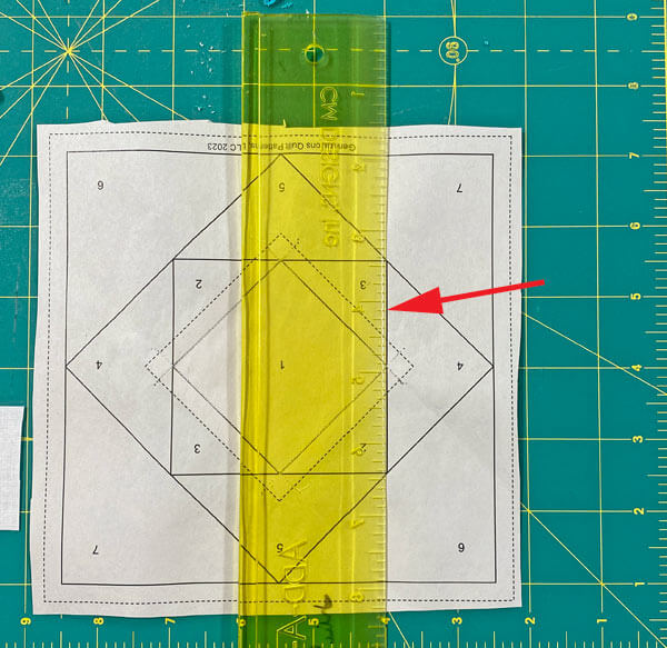 Line up your ruler with the seam line between #2/#3 and #4 on one side