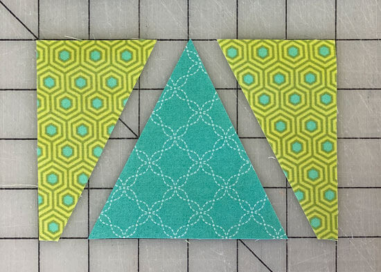 Arrange the patches to sew the Triangle in a Square unit Arrange the patches to sew the Triangle in a Square unit