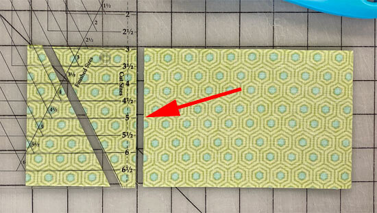 Subcut the second pair of mirror-imaged side triangles from your strip. Subcut the second pair of mirror-imaged side triangles from your strip.