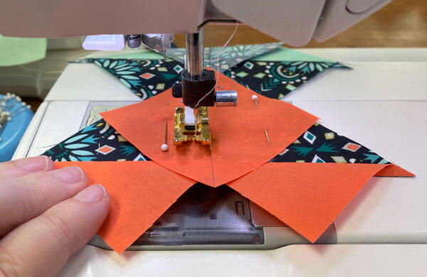 Stitch again on both sides of the drawn lines for each unit