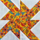 Click here to go to the Wheels quilt block tutorial