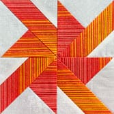 Click here for a traditionally pieced Wheels quilt block tutorial