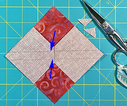 The trimmed edges of the 'Sky' square butt up against each other The trimmed edges of the 'Sky' square butt up against each other
