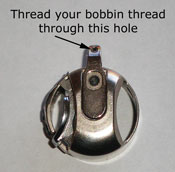 Bobbin case tension adjustment