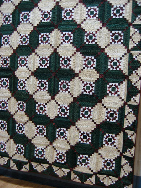 Log cabin quilt squares with a pieced center square