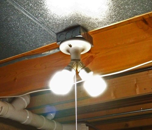 Overhead light for cutting table