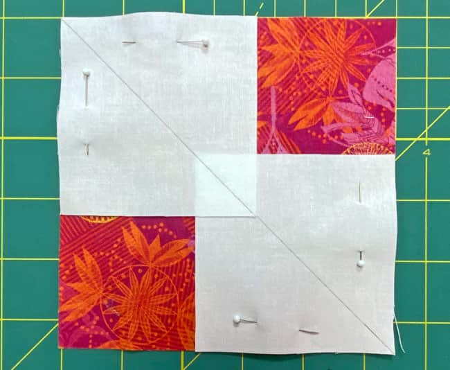 Position the marked Sky squares in two diagonal corners, matching their edges to the Goose corners