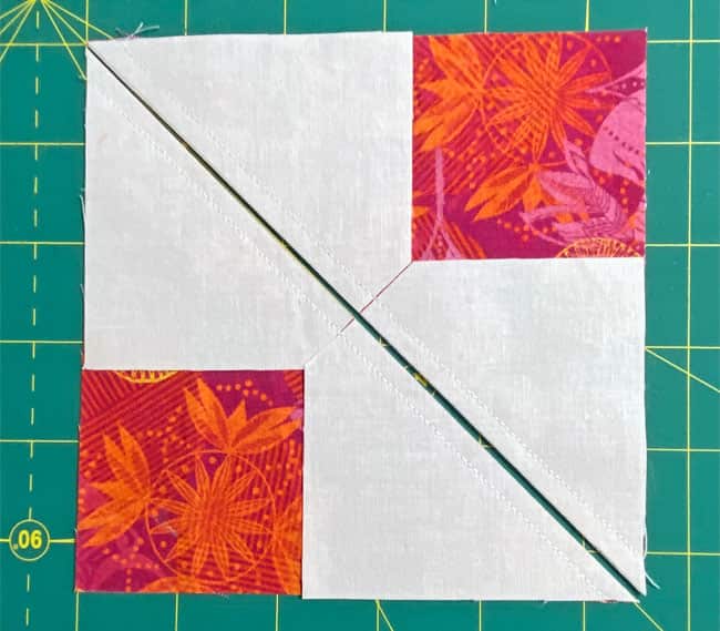 Cut the sewn Goose and Skys in half on the drawn line Cut the sewn Goose and Skys in half on the drawn line