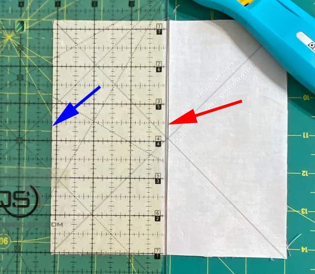 The first cut to turn our squares into twp equal rectangles The first cut to turn our squares into twp equal rectangles