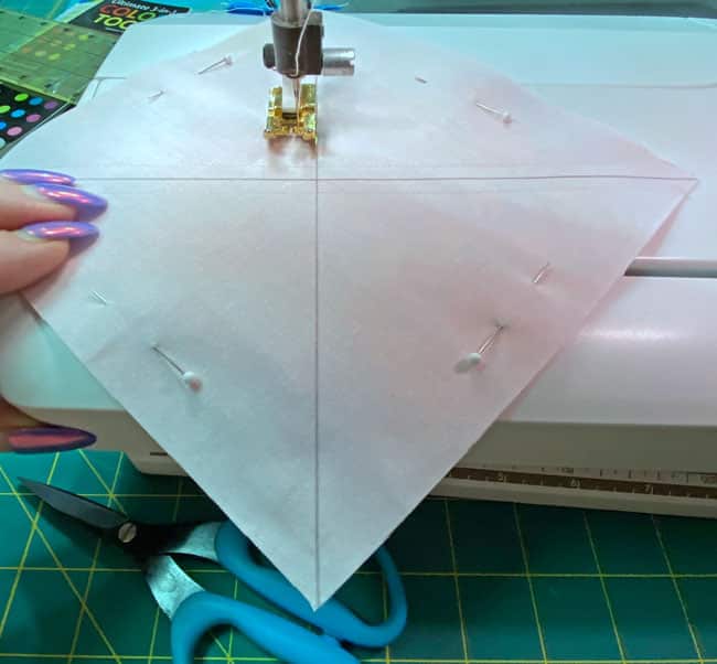 Stitch 1/4" away from both sides of each drawn line Stitch 1/4" away from both sides of each drawn line